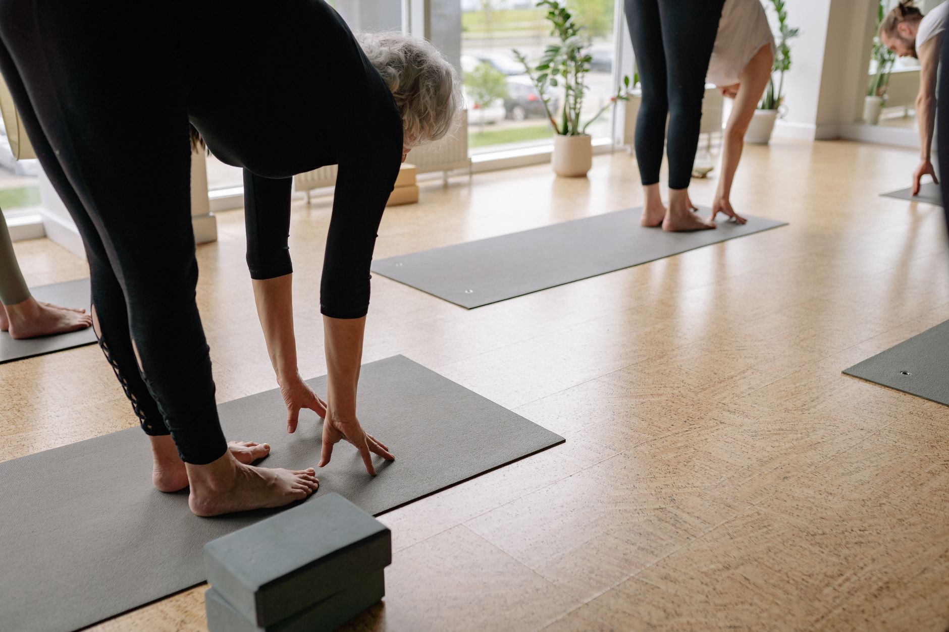 At-Home Yoga vs Studio Classes: Which Is Right for Beginners in Edmonton? At a Glance: Home Practice vs Studio Classes for Edmonton Beginners